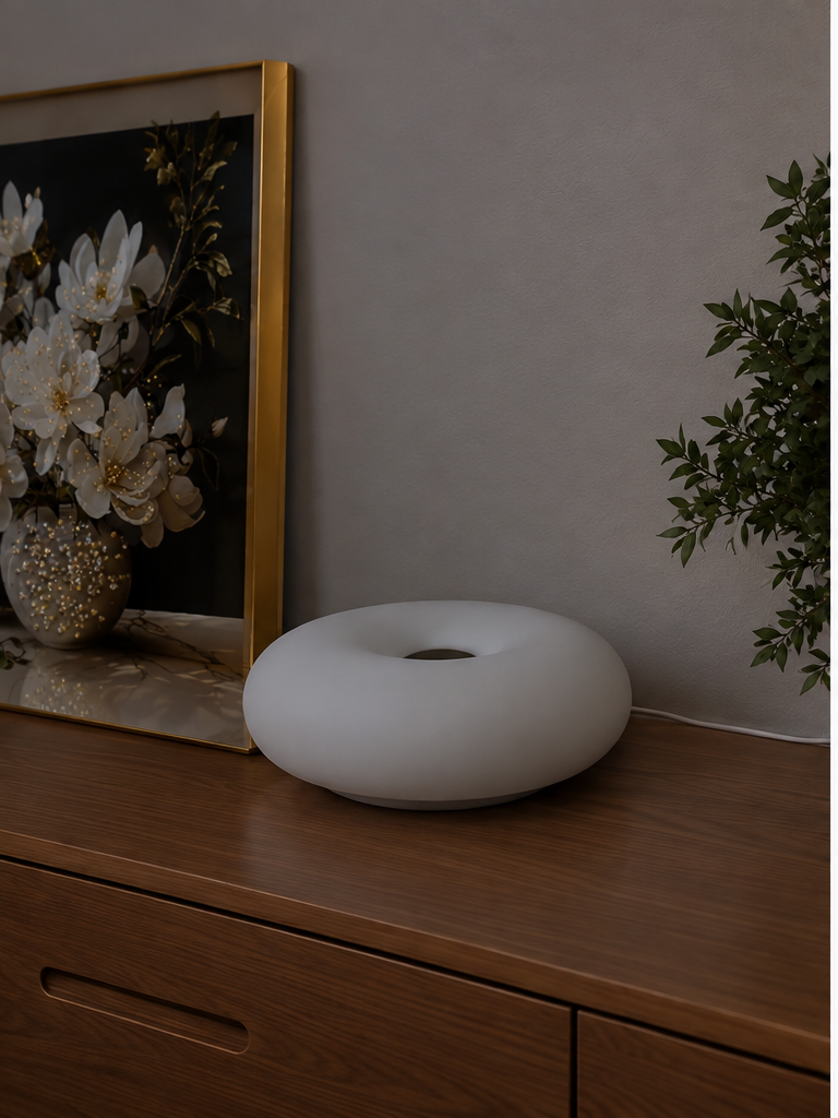 Donut lamp turned off in a room